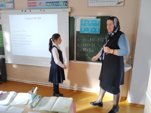 Открытый урок по математике  в 4 классе.